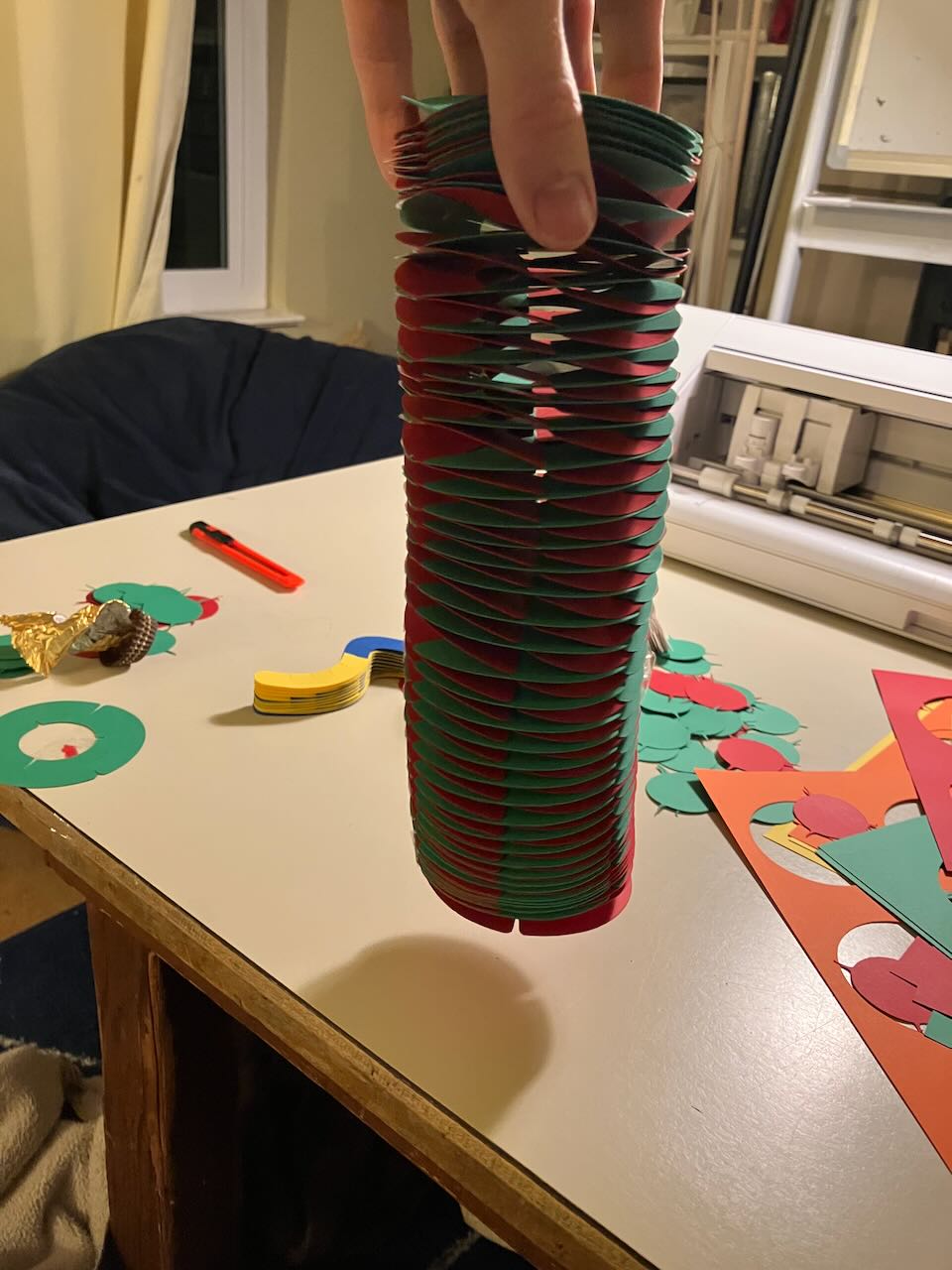 slinky-like stack of spirals of paper. Soon to become a torus.