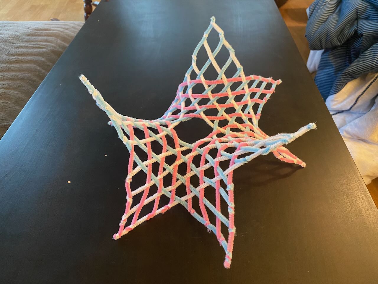  pipe cleaner object. There are hexagons everywhere, except the very center, which has a nonagon