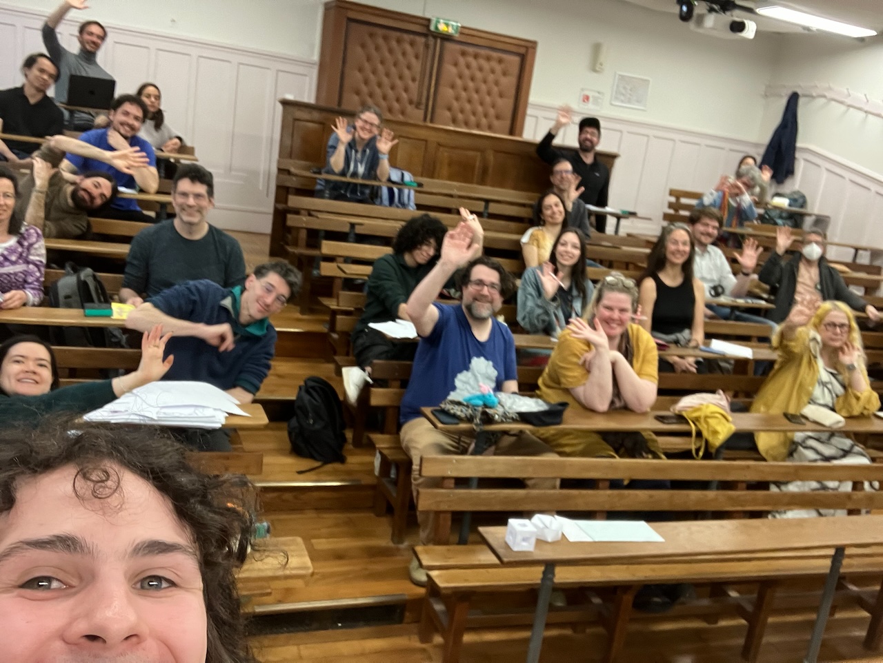 selfie in a lecture hall full of people
