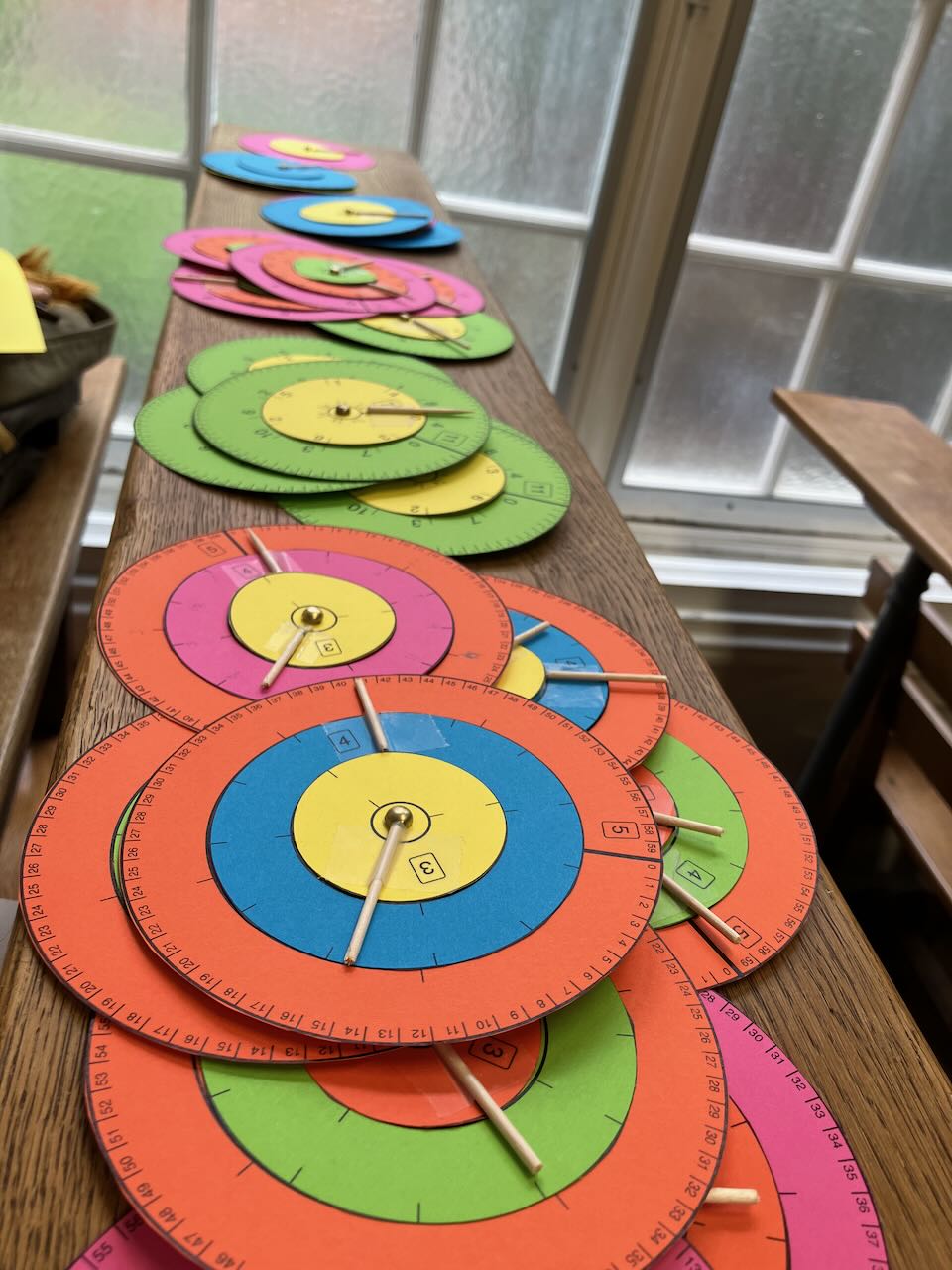 a large pile of colorful sun's dials 