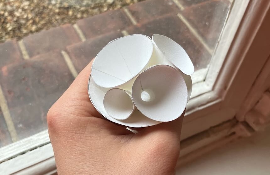 A collection of cones inside of a large cone. All cones share a tip, and are tangent to one another