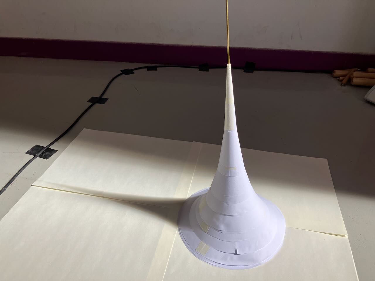 Cones stacked on top one another form a pseudosphere