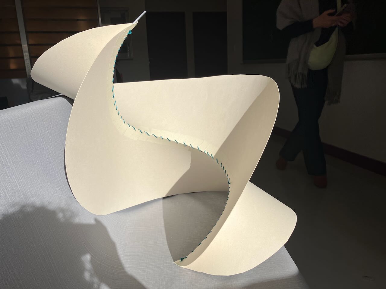 A large curving tangent developable, lounging on the couch