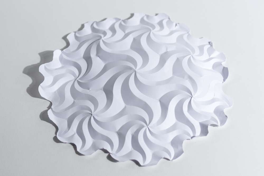 Curved crease origami model of a hyperbolic plane