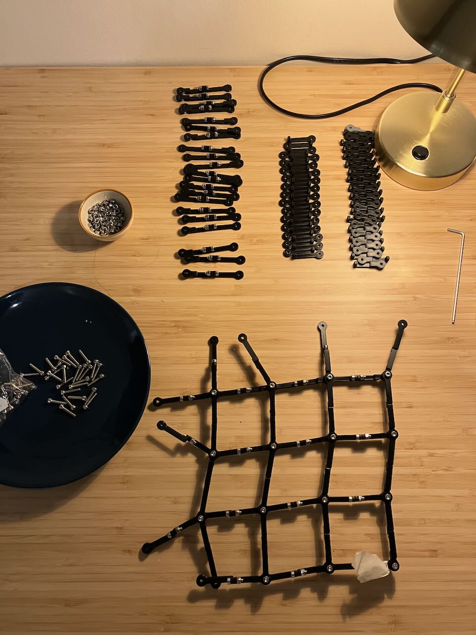 a picture of a work table. At the bottom, an in progress grid. At the top, many fundamental untis ready to use